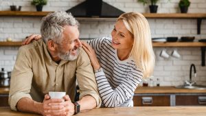 happy couple in the kitchen discussing Qualia Senolytic Customer Reviews